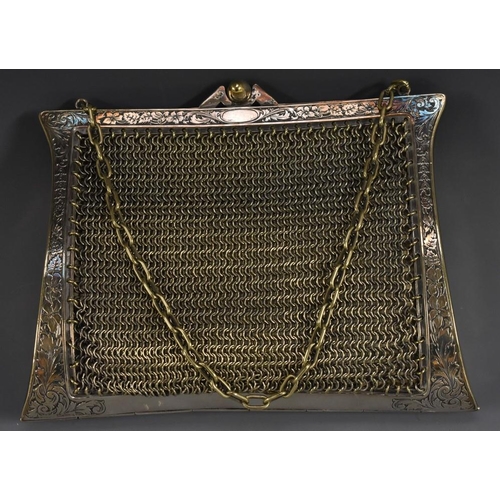 3374 - A plated framed mesh purse, engraved foliate decoration, chain handle, watered silk lining, fitted i... 