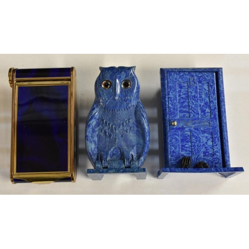 3375 - A Bourjois blue bakelite owl perfume holder; another similar door holder; a blue enamel musical comp... 