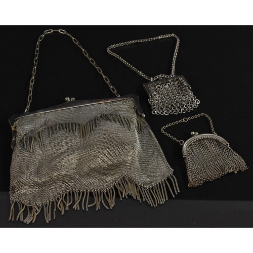 3382 - An Art Deco silver plated mesh purse, fringe detail, kid leather lined; two others smaller