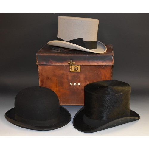 3387 - A black silk top hat, Tress & Co, made for George Tarver & Son, Burton-on-Trent,in Dunn & Co box; an... 