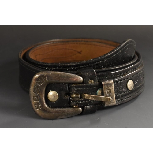 3389 - A lady's leather belt by Thomas Kettle, silver fittings with oversize hallmarks, all silver fittings... 