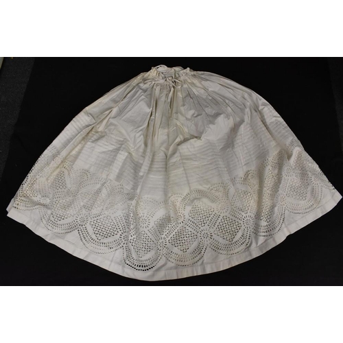 3421 - A lady's fine cotton petticoat, pleated detail, broiderie anglaise, feather stitch embroidery, draws... 