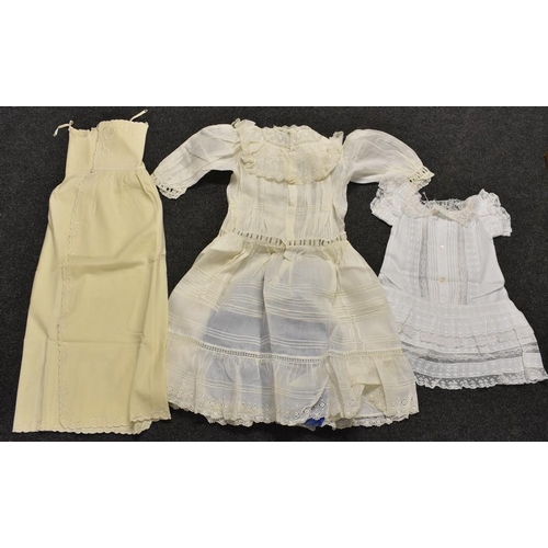 3429 - A child's flannel wrap over dress, embroidered; a fine cotton lawn dress,lace and pintuck detail, fo... 