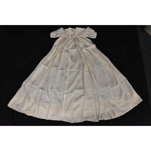 3430 - A late 19th Century Christening gown, lace over satin silk, ribbon trim; a silk Christening gown, sa... 