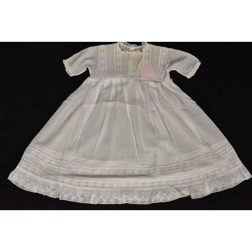 3437 - Items of Victorian and later baby's clothing to include a fine cotton lawn dress, dated 1866; anothe... 