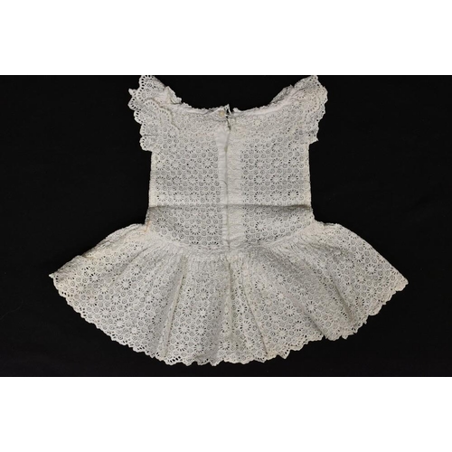 3449 - A fine broiderie anglaise child's dress, white cotton, mother of pearl button fastening