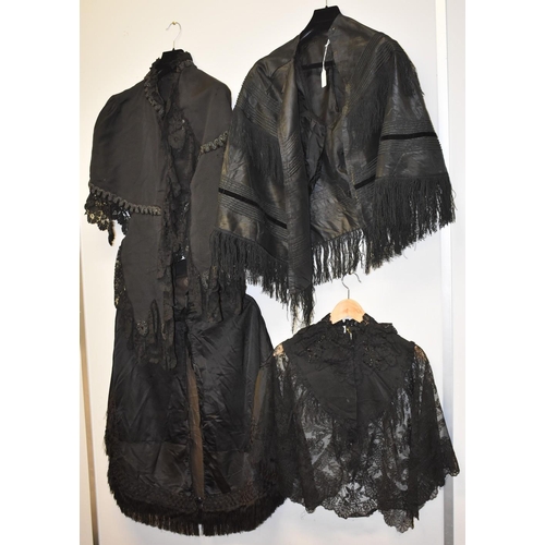 3459 - A late Victorian lace mourning cape, beaded detail; a silk fringed cape; others similar (6)