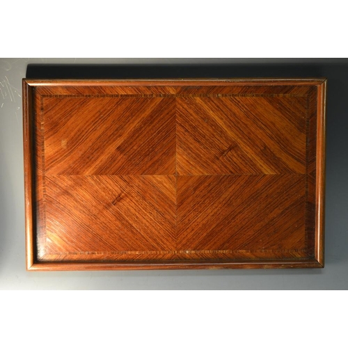 5088 - A French kingwood rectangular letter tray, the field quarter-veneered and crossbanded, shallow galle... 