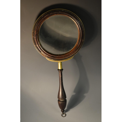 5090 - A George III brass bound mahogany gallery glass or connoisseur's lens, turned border and handle, 33c... 