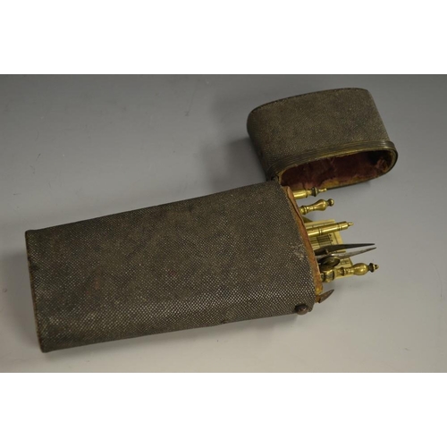 5096 - A George III shagreen tapered rounded rectangular draughtsman's etui, hinged cover enclosing an arra... 