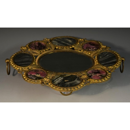 5106 - A Grand Tour gilt metal mounted agate shaped oval tazza, set with nine panels of specimen stones, lo... 