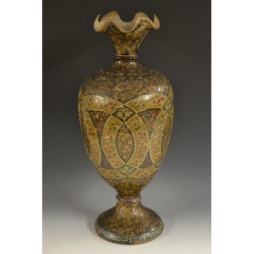 5111 - A large 19th century Indian hide, lacquer and penwork ovoid vase, decorated in the Kashmiri taste wi... 