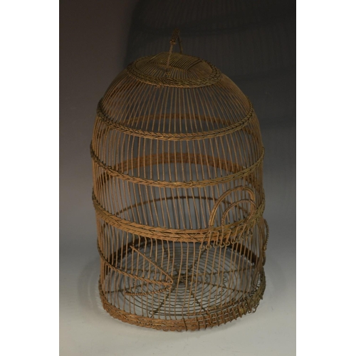 5117 - A late 19th century domed circular wirework bird carriage, the lower front with two arrows centring ... 