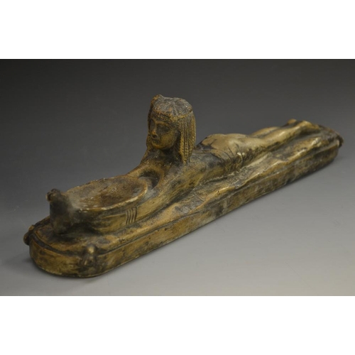 5134 - A museum type plaster model, after the Ancient Egyptian, of an outstretched female deity grasping a ... 