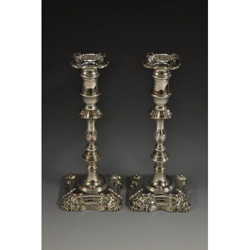 5145 - A pair of 19th century Old Sheffield plate table candlesticks, detachable nozzles, waisted campana s... 