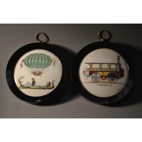 5156 - A pair of early 20th century French porcelain roundels, transfer printed with a steam train and a ho... 