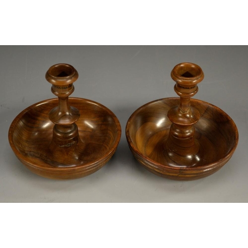 5157 - A pair of early 20th century Jerusalem olivewood 'Brighton bun' travelling candlesticks, campana sco... 