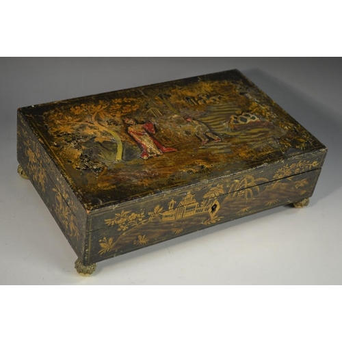 5170 - A Regency japanned rectangular playing card box, decorated in the Chinoiserie taste with a Chinese o... 