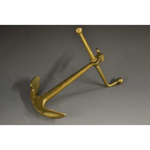 5191 - A Victorian gilt brass novelty desk weight, cast as a ship's anchor, axe head handle, 19cm long, c.1... 