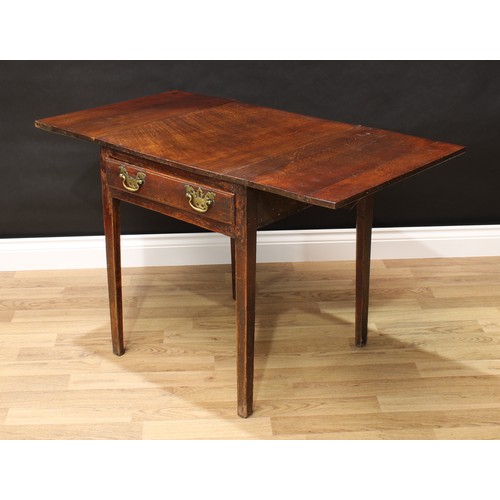 76 - A 19th century oak vernacular dropleaf table, rectangular top above a frieze drawer, brass bat shape... 