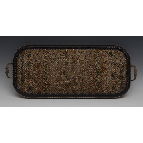 105 - A 19th century curled paper mounted rounded rectangular tray, the field colourfully decorated with d... 