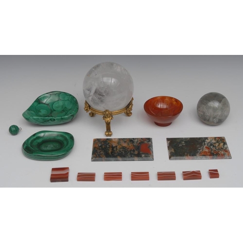 121 - A 'rock crystal' sphere, ormolu stand cast with masks, 13.5cm high; a fluorspar desk weight, 6.5cm d... 