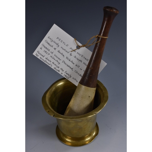 3355 - Local Interest - an early-mid 19th century apothecary's mortar and pestle, brass everted mortar with... 