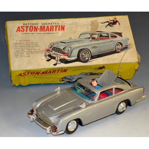 5077 - A C Gilbert (Japan) Battery Operated Aston Martin DB5, large scale grey tinplate Aston Martin styled... 