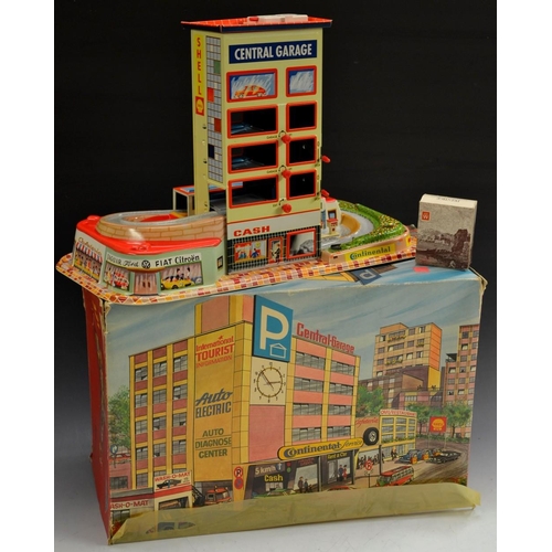 5096 - Technofix - a vintage 1950/60s lithographed tin plate Central Garage, No 321, with five different co... 