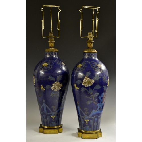 130 - A pair of large gilt metal mounted Chinese cloisonne enamel ovoid table lamps, each decorated with s... 