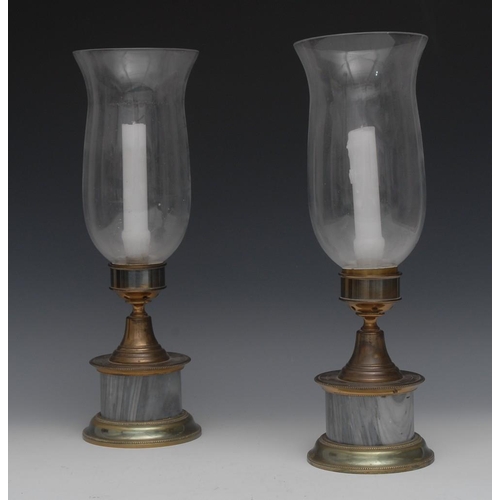 131 - A pair of marble and lacquered brass storm lanterns, slender bell shaped shades, square cylindrical ... 