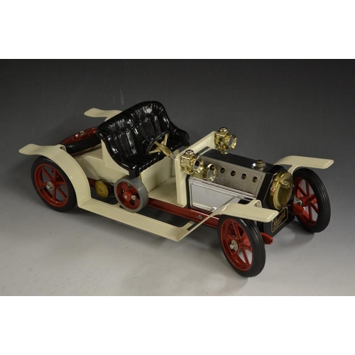 5296 - Mamod  - a Steam powered creamy white Roadster car, open top, black seat, red chassis and spoked whe... 