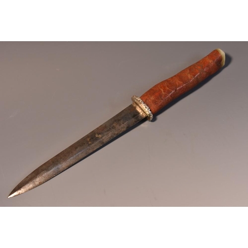 3704 - A 19th century dagger, 15cm pointed double-edged blade, the coral grip with mother-of-pearl pommel, ... 