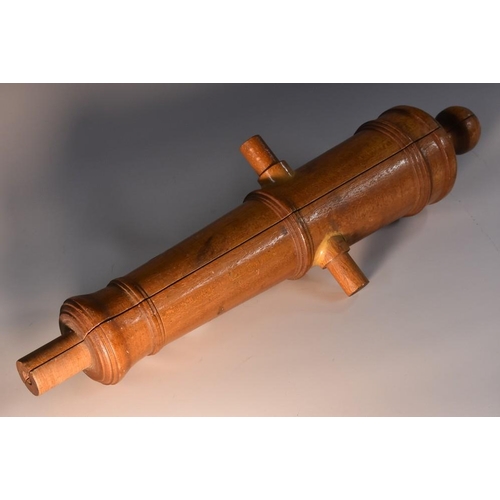 3733 - A gunfounder's signal cannon barrel maquette, the mahogany model in two halves, the inside marked ou... 