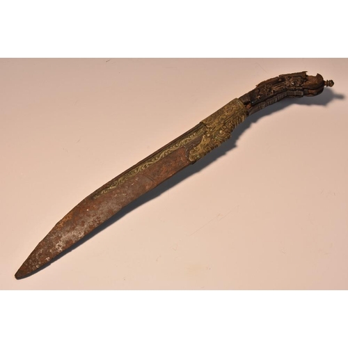 3744 - A Sinhalese piha kaetta dagger, 15cm blade, brass mounts, chased with scrolling foliage, fragmentary... 