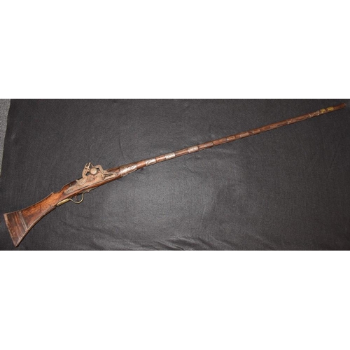 3756 - An Afghan flintlock jezail, 117cm barrel, walnut full-stock, 153cm long