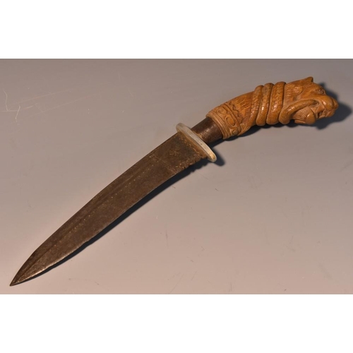 3761 - An Indian dagger, 17cm slightly serpentine blade, wooden grip carved with a ferocious tiger, 27.5cm ... 