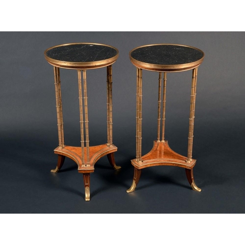 157 - A pair of Louis XVI design ormolu and burr walnut gueridons, in the Weisweiler taste, each with circ... 