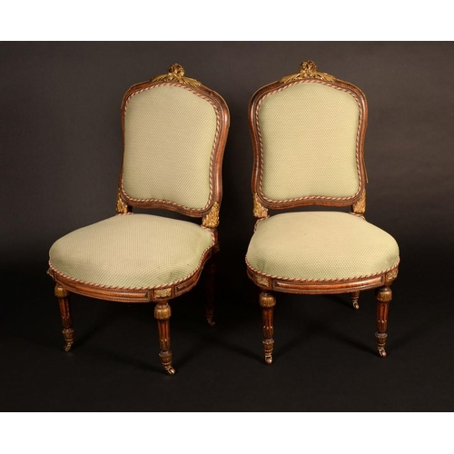 168 - A pair of Victorian Franglais ormolu mounted walnut side chairs, in the Louis XVI taste, cartouche s... 