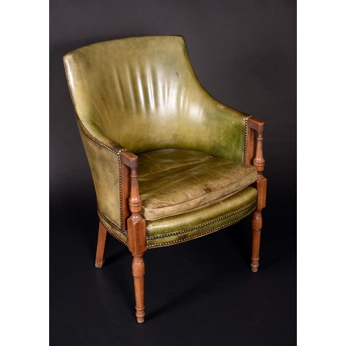 175 - A George III design mahogany library chair, curved rectangular back, downswept arms terminating in t... 