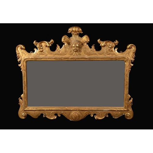 177 - A 19th century giltwood and gesso landscape pier glass, bold acanthus scroll border crested by a che... 