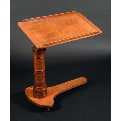 180 - A Victorian teak invalid's reading/work table, rounded rectangular adjustable plateau, turned column... 