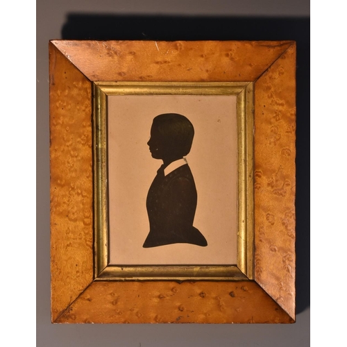 4019 - English School (19th century), a silhouette, of George Longman Wood as a school boy, half-length, in... 