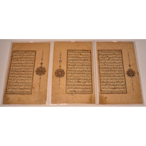 4053 - A set of three Persian calligraphy manuscript pages, each two-sided, inscribed in Arabic and decorat... 