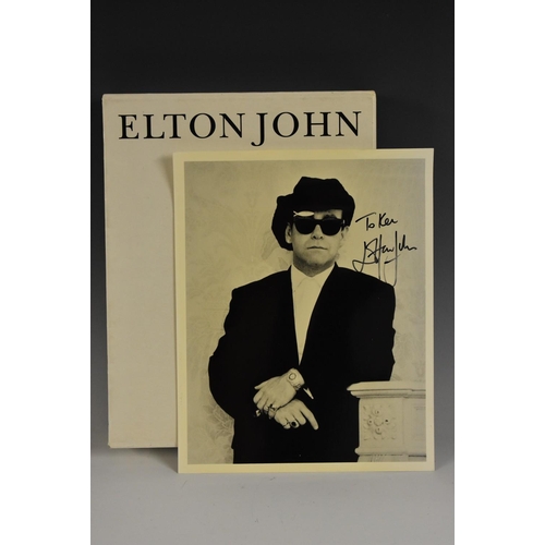 4103 - Sale Catalogue - Sotheby's:~ Elton John, September 1988, four-volume set, slipcased en suite; a b/w ... 