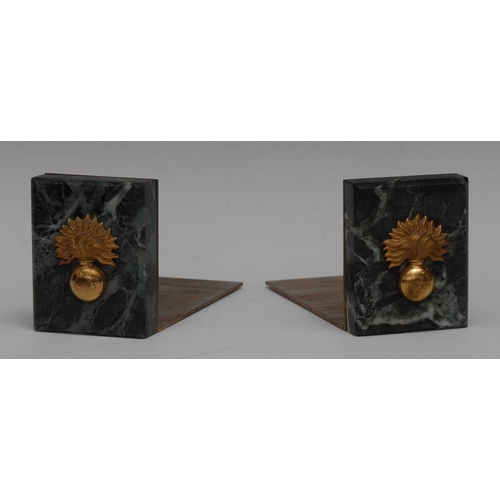 96 - Grenadier Guards - a pair of gilt brass mounted Breccia marble bookends, each applied with flaming g... 