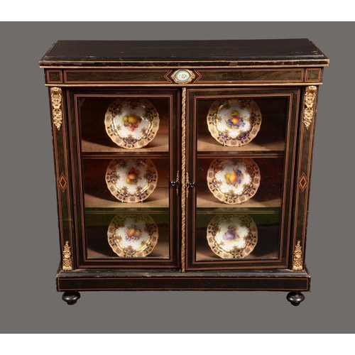 1570 - A Victorian gilt-metal and porcelain mounted ebonised pier cabinet, moulded rectangular top above a ... 