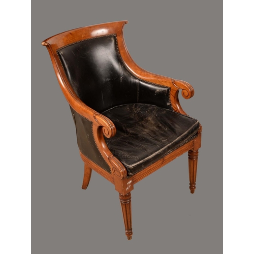 1575 - A post-Regency design library armchair, curved back, downswept arms terminating in lotus scrolls, sq... 