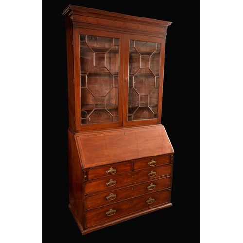 1581 - A George III mahogany bureau bookcase, astragal glazed doors above a fall front enclosing a fitted i... 