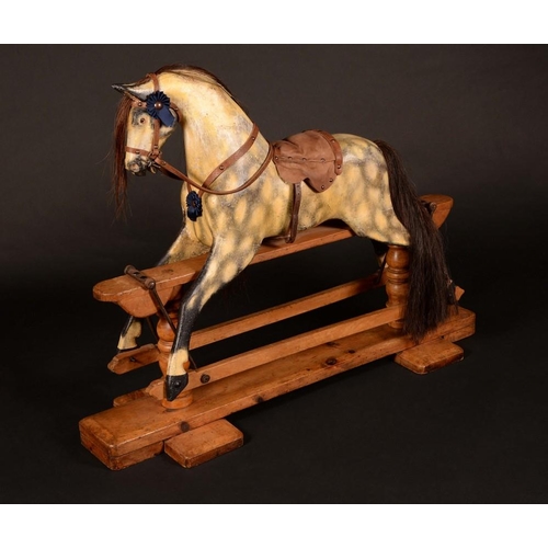 1582 - A late Victorian child's rocking horse, by Turnbull, dapple grey paint work, oak trestle base, 122cm... 